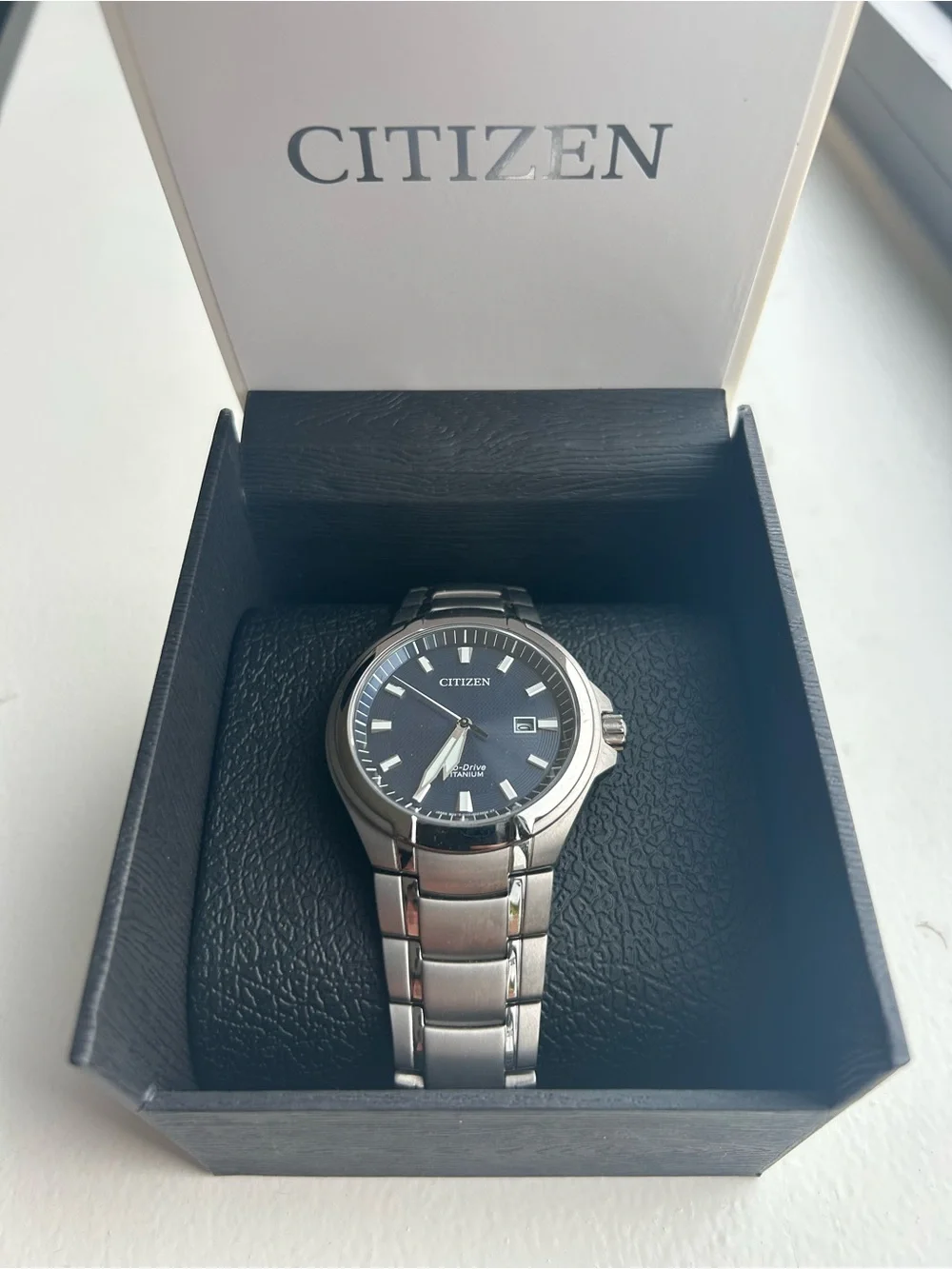 Citizen Paradigm Super Titanium Watch with Blue Dial & Stainless Bracelet